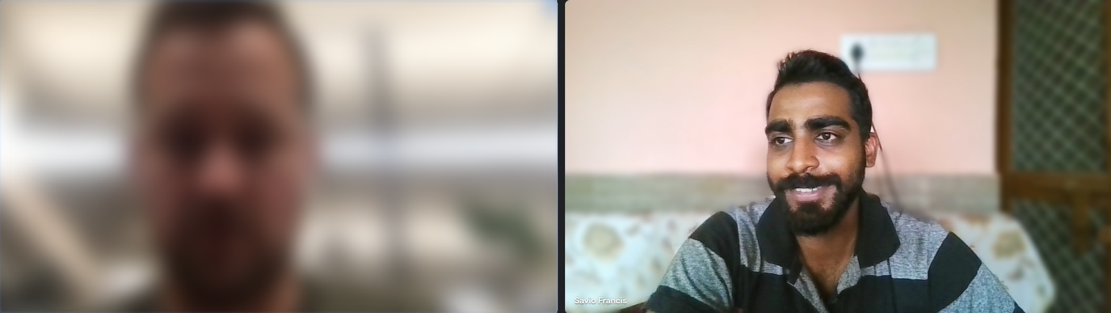 Savio Francis on a client video call, the client obscured